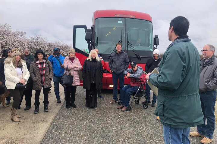Farmer talk along the blossom trail. 
